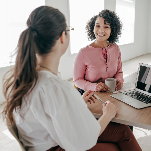 two women talking about hr services